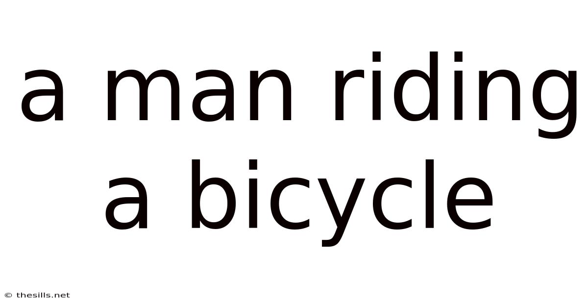 A Man Riding A Bicycle